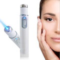 A Blue Light Therapy Facial Pen vertically placed with a diagonal pen in the back displaying its blue light. A model with her hand on her face on the right.
