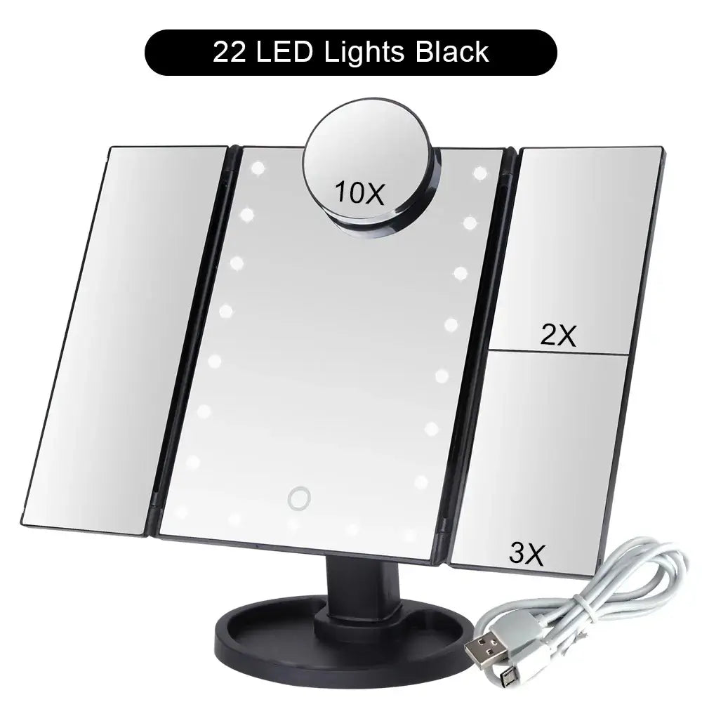 The Black LED Touch-Screen Makeup Mirror, showing its 2x, 3x and 10x magnification mirrors, its charging cord and its 22 LED lights.