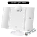 The White LED Touch-Screen Makeup Mirror, showing its 2x, 3x and 10x magnification mirrors, its charging cord and its 22 LED lights.